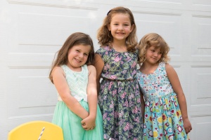 Photo of three girls in dresses